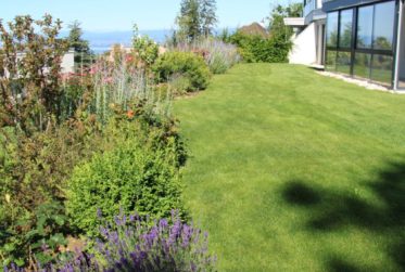 SPLENDIDE APPARTEMENT EN REZ DE JARDIN AVEC VUE LAC ET MONTAGNES A LUTRY