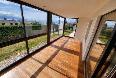 SPLENDIDE APPARTEMENT EN REZ DE JARDIN AVEC VUE LAC ET MONTAGNES A LUTRY