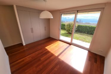 SPLENDIDE APPARTEMENT EN REZ DE JARDIN AVEC VUE LAC ET MONTAGNES A LUTRY